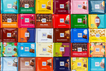 Stuttgart, Germany - March 1, 2021: Ritter Sport chocolate chocolates different types variety background in Germany.のeditorial素材