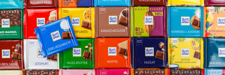 Stuttgart, Germany - March 1, 2021: Ritter Sport chocolate chocolates different types variety background banner in Germany.のeditorial素材