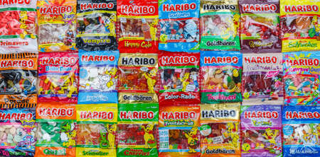 Stuttgart, Germany - March 7, 2021: Haribo gummy bear gummi candy candies different types variety background banner in Stuttgart, Germany.のeditorial素材