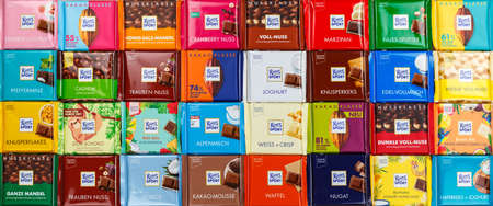 Stuttgart, Germany - March 1, 2021: Ritter Sport chocolate chocolates different types variety background banner in Germany.のeditorial素材