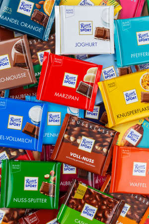 Stuttgart, Germany - March 1, 2021: Ritter Sport chocolate chocolates different types variety background portrait format in Germany.のeditorial素材