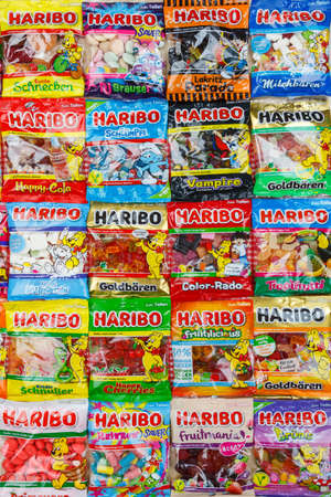 Stuttgart, Germany - March 7, 2021: Haribo gummy bear gummi candy candies different types variety background portrait format in Stuttgart, Germany.のeditorial素材