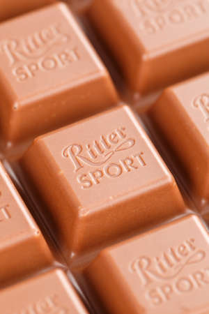 Stuttgart, Germany - March 8, 2021: Ritter Sport chocolate bar company logo portrait format in Stuttgart, Germany.のeditorial素材