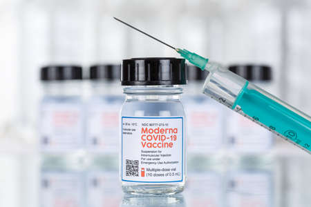 Stuttgart, Germany - March 19, 2021: Moderna Coronavirus Vaccine Corona Virus COVID-19 Covid syringe vaccines in Germany.のeditorial素材