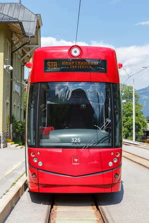 Fulpmes, Austria - August 1, 2020: Stubaitalbahn Innsbruck Tram Bombardier train portrait format Fulpmes station in Austria.のeditorial素材