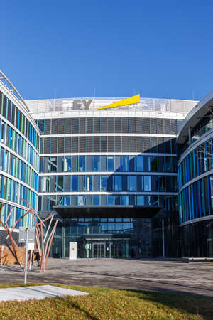 Stuttgart, Germany - December 19, 2020: Ernst & Young EY headquarter HQ Skyloop building portrait format at Stuttgart airport in Germany.のeditorial素材