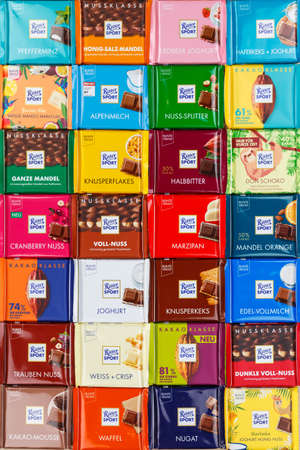 Stuttgart, Germany - March 1, 2021: Ritter Sport chocolate chocolates different types variety background portrait format in Germany.のeditorial素材