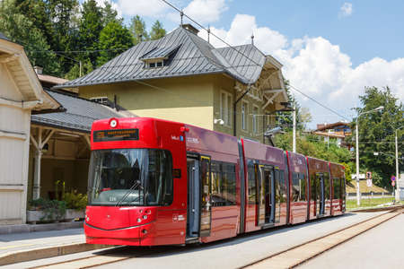 Fulpmes, Austria - August 1, 2020: Stubaitalbahn Innsbruck Tram Bombardier train Fulpmes station in Austria.のeditorial素材