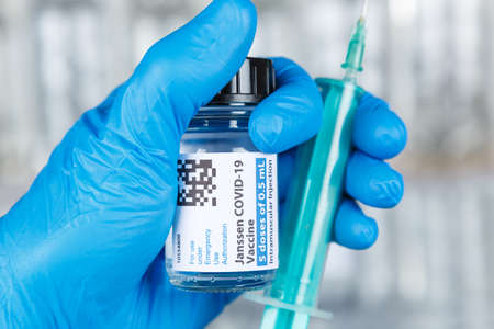 Stuttgart, Germany - March 19, 2021: Johnson & Johnson Coronavirus Vaccine Corona Virus COVID-19 Covid syringe vaccines in Germany.のeditorial素材