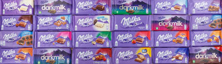 Stuttgart, Germany - March 3, 2021: Milka chocolate chocolates different types variety background banner in Germany.のeditorial素材