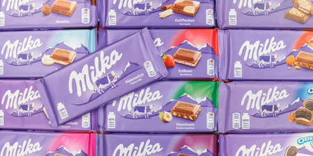 Stuttgart, Germany - March 3, 2021: Milka chocolate chocolates different types variety background banner in Germany.のeditorial素材