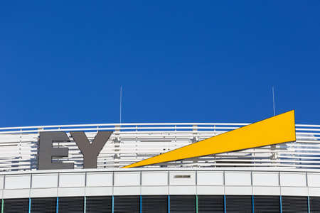 Stuttgart, Germany - December 19, 2020: Ernst & Young EY logo headquarter HQ copyspace copy space at Stuttgart airport in Germany.のeditorial素材