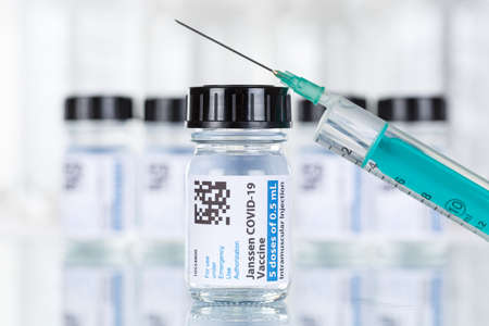 Stuttgart, Germany - March 19, 2021: Johnson & Johnson Coronavirus Vaccine Corona Virus COVID-19 Covid syringe vaccines in Germany.のeditorial素材