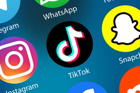 Stuttgart, Germany - April 5, 2021: TikTok Tik Tok logo social media icon marketing network on the internet background in Stuttgart, Germany.のeditorial素材