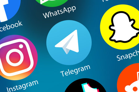 Stuttgart, Germany - April 5, 2021: Telegram Messenger Message logo icon marketing network on the internet background in Stuttgart, Germany.のeditorial素材