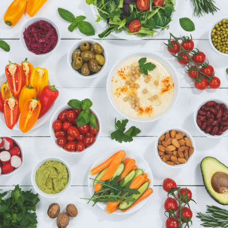 Vegan food vegetables background healthy organic on a wooden board squareの写真素材