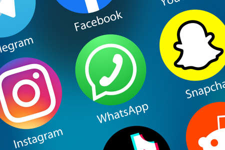 Stuttgart, Germany - April 5, 2021: WhatsApp Messenger Message logo social media icon marketing network on the internet background in Stuttgart, Germany.のeditorial素材