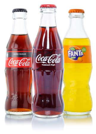 Stuttgart, Germany - August 24, 2021: Coca Cola Coca-Cola Fanta products lemonade soda drinks in bottles isolated on a white background in Stuttgart, Germany.のeditorial素材