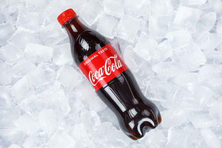 Stuttgart, Germany - August 31, 2021: Coca Cola Coca-Cola in plastic bottle lemonade soft drink on ice cubes in Stuttgart, Germany.のeditorial素材