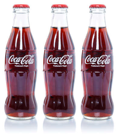 Stuttgart, Germany - August 24, 2021: Coca Cola Coca-Cola lemonade soda soft drinks in bottles isolated on a white background in Stuttgart, Germany.のeditorial素材