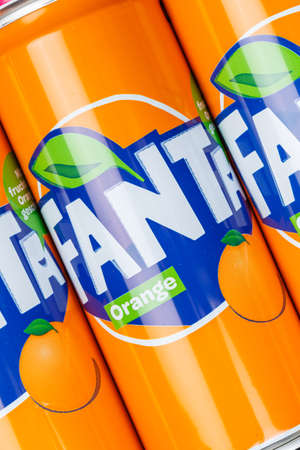 Stuttgart, Germany - January 17, 2021: Fanta orange lemonade soft drink in can background portrait format in Stuttgart, Germany.のeditorial素材