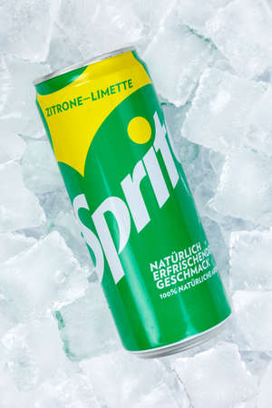 Stuttgart, Germany - August 31, 2021: Sprite lemonade soft drink in a can on ice cubes portrait format in Stuttgart, Germany.のeditorial素材