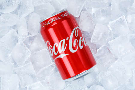 Stuttgart, Germany - August 31, 2021: Coca Cola Coca-Cola in a can lemonade soft drink on ice cubes in Stuttgart, Germany.のeditorial素材