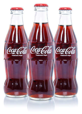 Stuttgart, Germany - August 24, 2021: Coca Cola Coca-Cola lemonade soft drinks in bottles isolated on a white background in Stuttgart, Germany.のeditorial素材