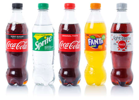 Stuttgart, Germany - August 29, 2021: Coca Cola Coca-Cola Fanta Sprite products lemonade soft drink in plastic bottles isolated on a white background in Stuttgart, Germany.のeditorial素材