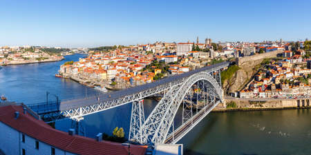 Porto Portugal with bridge Ponte Dom Luis I Douro river town travel panorama travelingの写真素材
