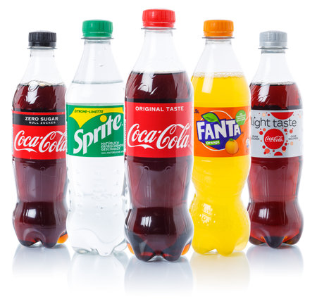 Stuttgart, Germany - August 29, 2021: Coca Cola Coca-Cola Fanta Sprite lemonade soft drink in plastic bottles isolated on a white background in Stuttgart in Germany.のeditorial素材