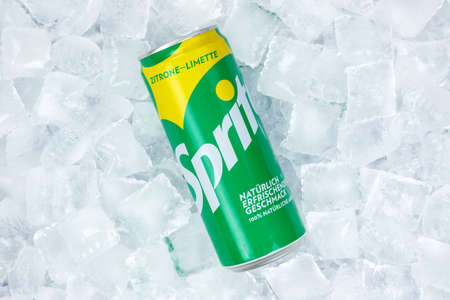 Stuttgart, Germany - August 31, 2021: Sprite lemonade soft drink in a can on ice cubes in Stuttgart, Germany.のeditorial素材