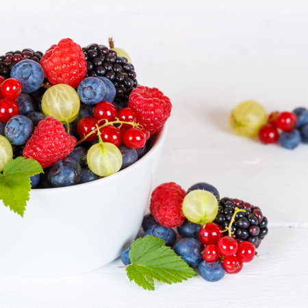 Berries fruits berry fruit strawberries strawberry blueberries blueberry square in a bowl summerの写真素材