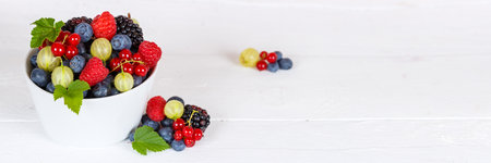 Berries fruits berry fruit strawberries strawberry blueberries blueberry panorama in a bowl summerの写真素材