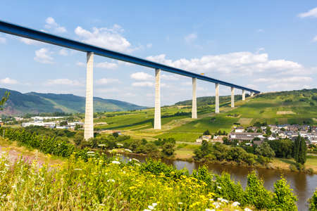 Bridge over Moselle river in Zeltingen Germany roadの写真素材