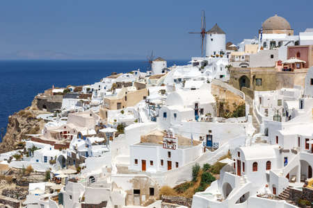Santorini island holidays in Greece travel traveling Oia town Mediterranean Sea with windmills Santorin Greekの写真素材