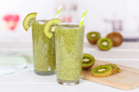 Green smoothie fruit juice kiwi drink in a glass healthy drinkingの写真素材