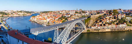 Porto Portugal with bridge Ponte Dom Luis I Douro river town travel panorama travelingの写真素材