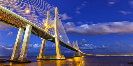 Lisbon Portugal bridge Ponte Vasco da Gama over Tejo river town travel panorama travelingの写真素材
