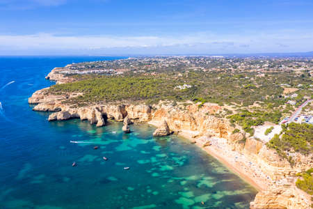 Portugal Algarve beach Praia da Marinha sea ocean drone view aerial photo from above waterの写真素材
