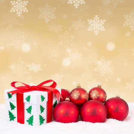 Christmas card gift present gold decoration gifts winter snow snowing balls square surpriseの写真素材