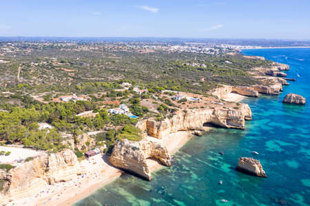 Portugal Algarve beach Praia da Marinha sea ocean drone view aerial photo from above waterの写真素材