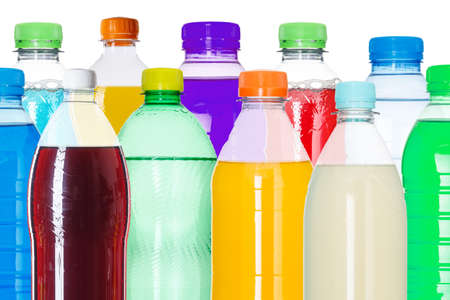 Drinks lemonade cola drink soft drinks in bottles isolated on a white backgroundの写真素材