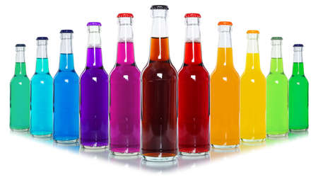 Drinks lemonade cola drink many soft drinks bottles in a row bottle isolated on whiteの写真素材