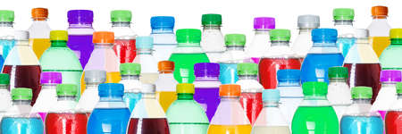 Drinks lemonade cola drink soft drinks in bottles background panorama background isolated on whiteの写真素材