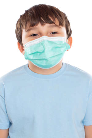 Child kid little boy wearing face mask against virus Virus portrait format isolated on a white backgroundの写真素材