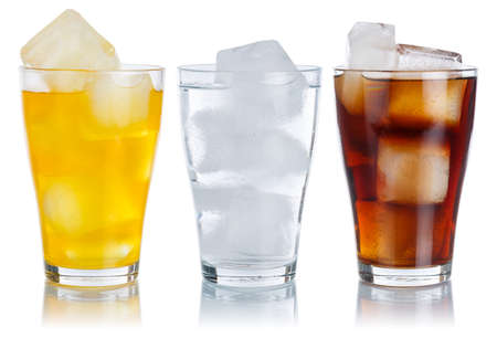 Drinks lemonade cola drink soft drinks glass in a row isolated on a white backgroundの写真素材