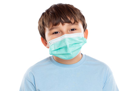 Child kid little boy wearing face mask against virus  portrait isolated on a white backgroundの写真素材