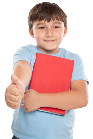 Young student child kid little boy showing thumbs up isolated on a white background portrait formatの写真素材