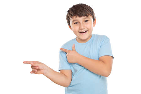 Child kid little boy showing with finger pointing on ad advertising isolated on a white backgroundの写真素材